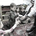 petting the black rat snake